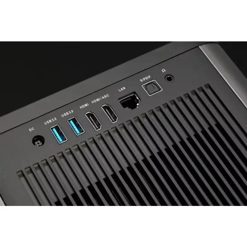 A sleek, dark grey Dangbei F3 4K smart projector is shown from the front, highlighting its lens and speaker grille texture on a plain background.